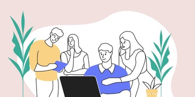 people by a laptop (how to optimise your marketing team for long-term flexible working)