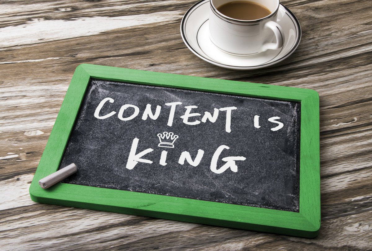 Content is king written on a slate board