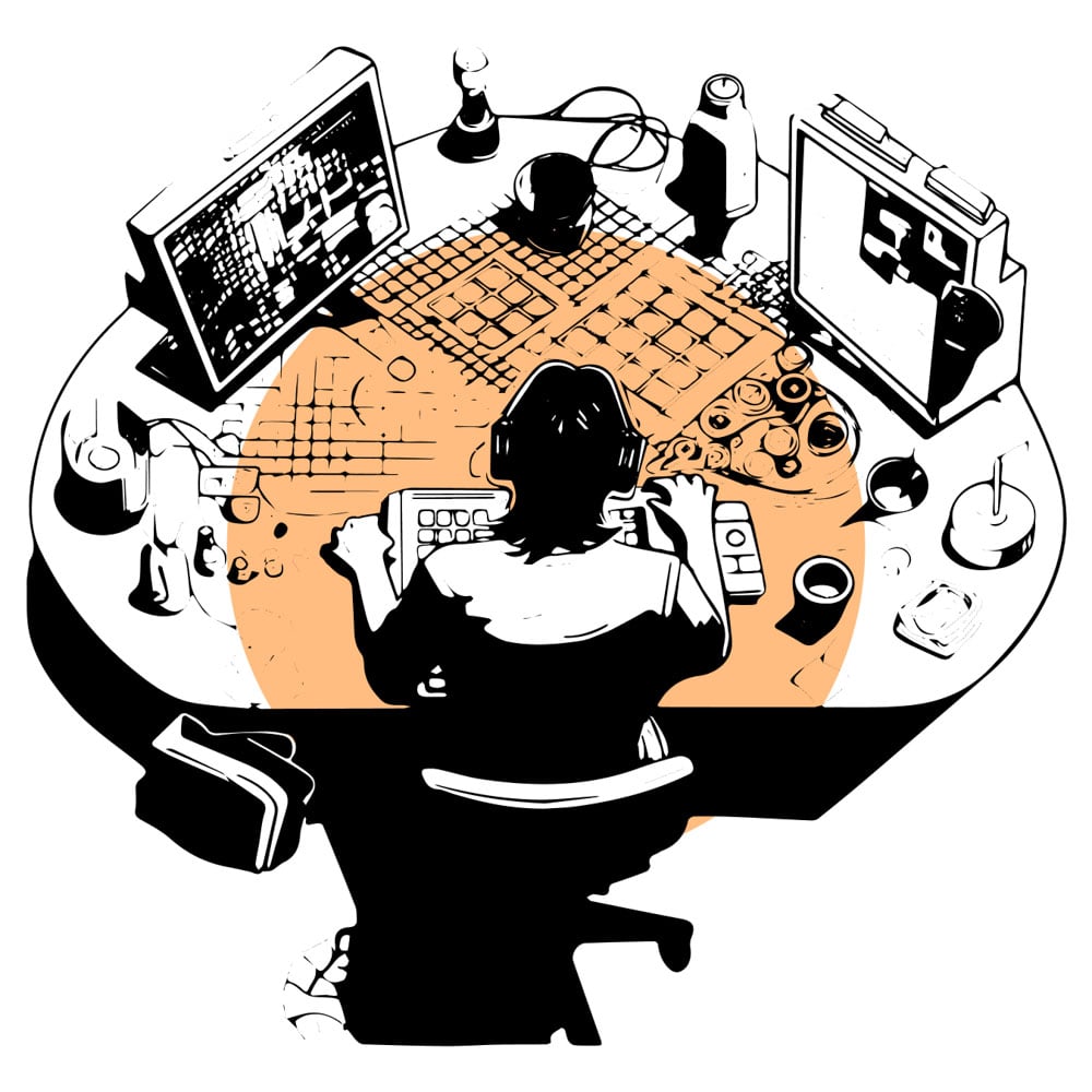 A person working at a desk on a digital project