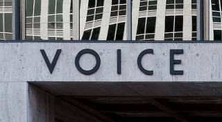 writing an About us page: Voice on a building
