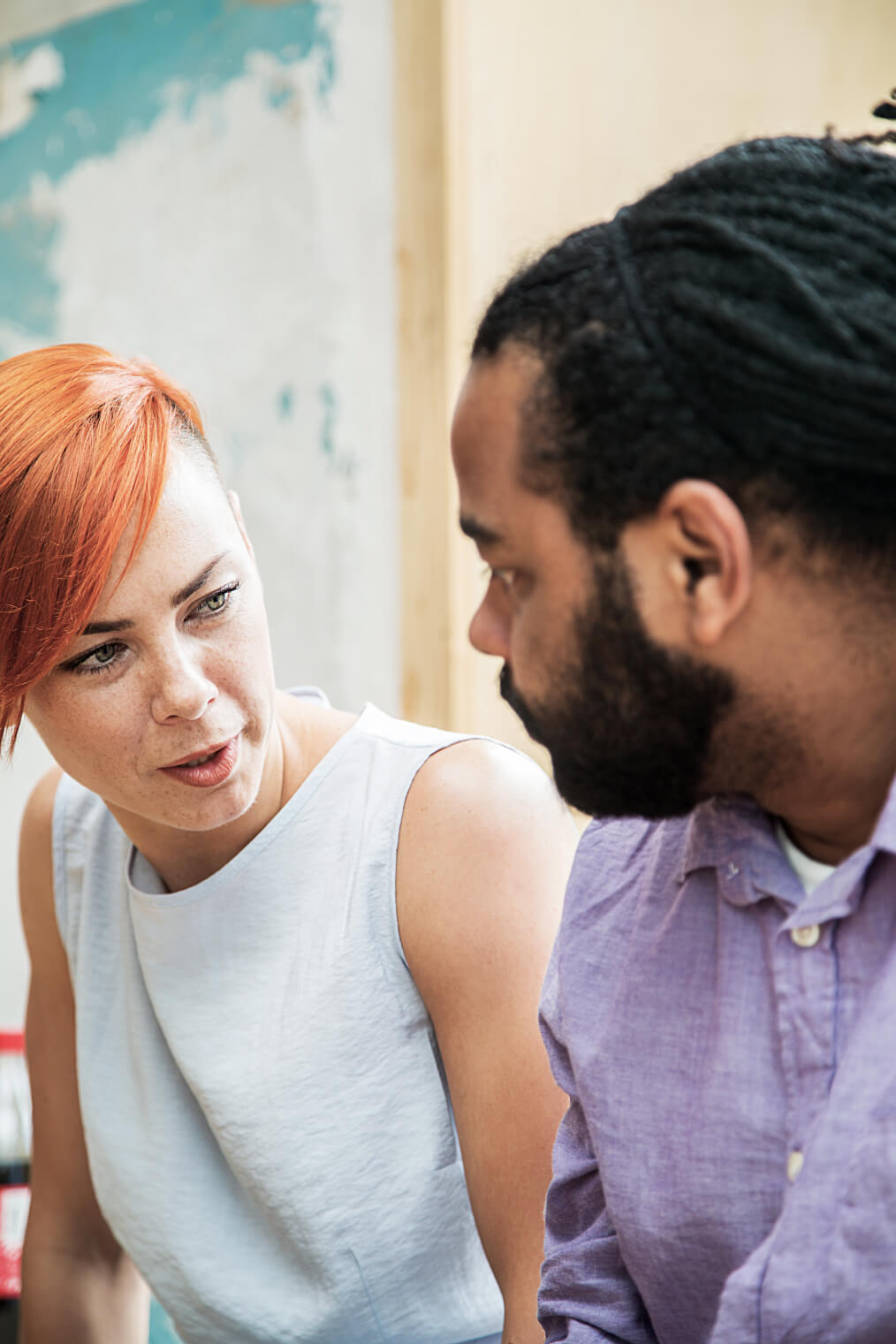 Two people conversing in office (1)