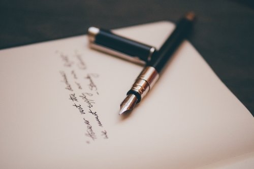 Fountain pen and handwritten letter