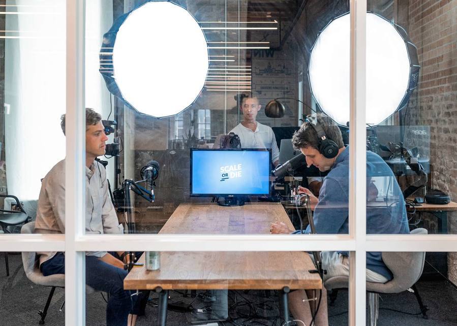 three men in a sound studio